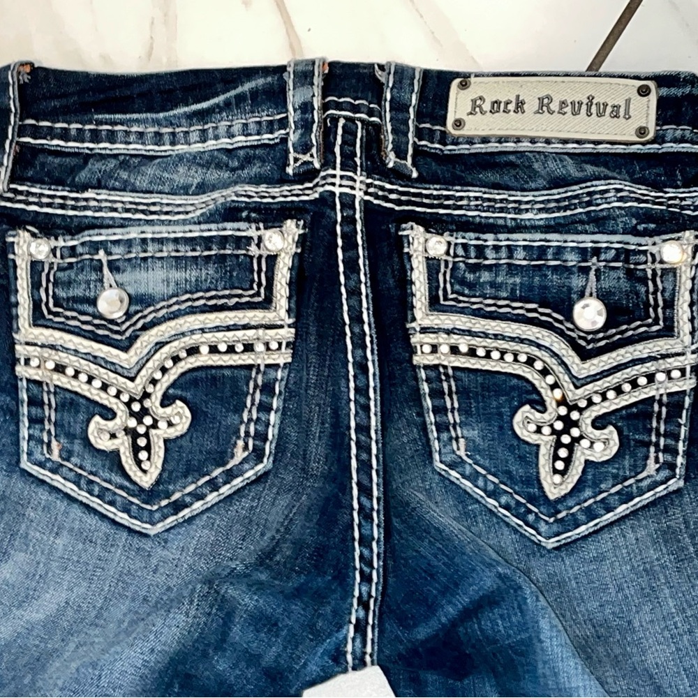 Rock Revival Med Wash Betty Boot cut double stitch jeans.